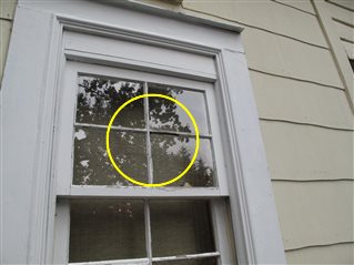 Window glazing putty at one or more windows is missing.