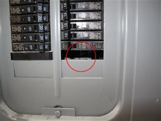 Exposed wiring exist in the main service panel.