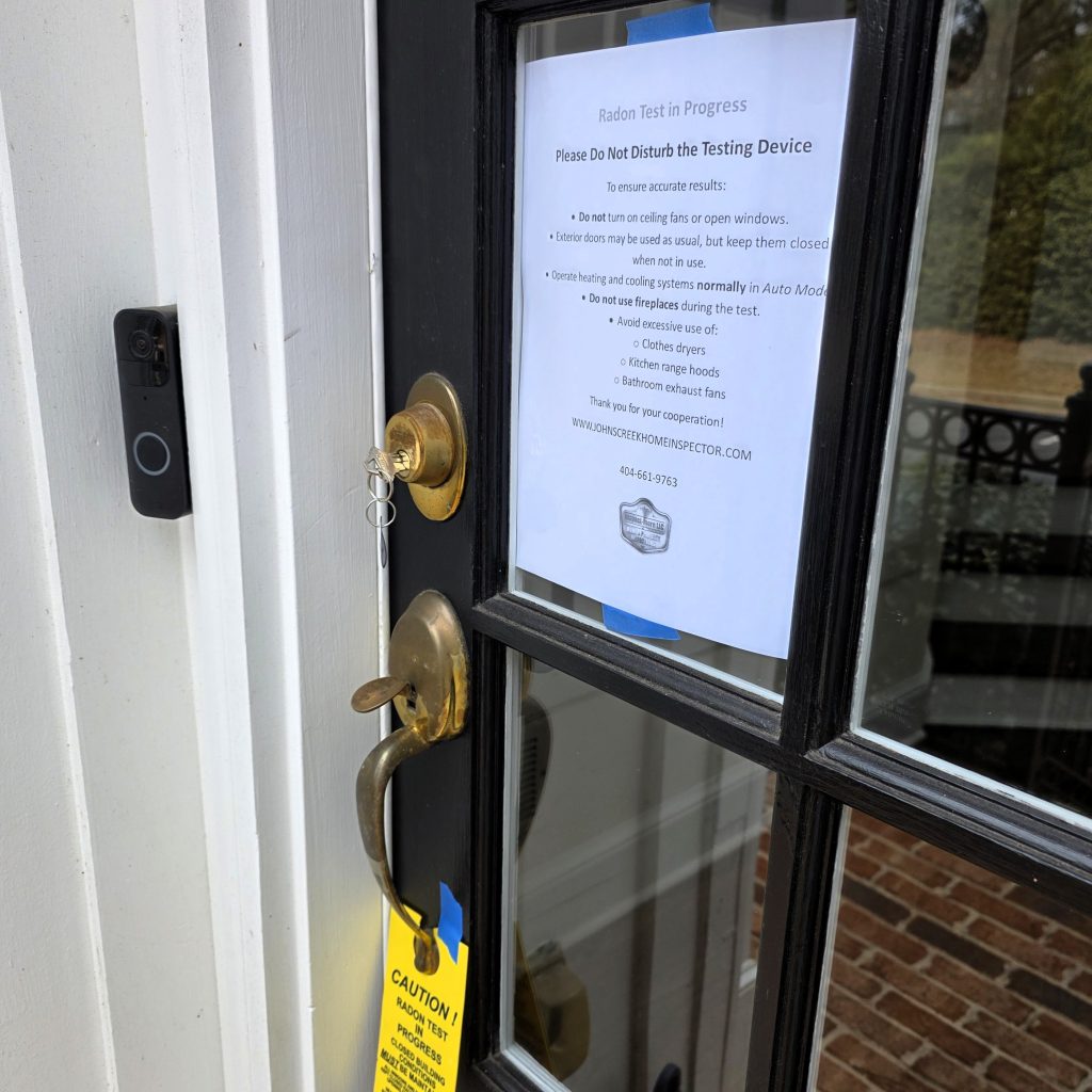 Radon test in progress notice posted to maintain closed-house conditions