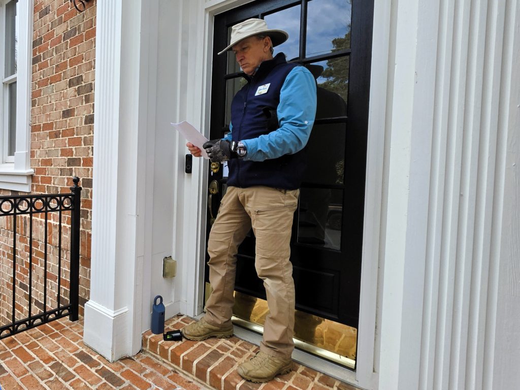 Home inspector reviewing inspection plan before starting the inspection